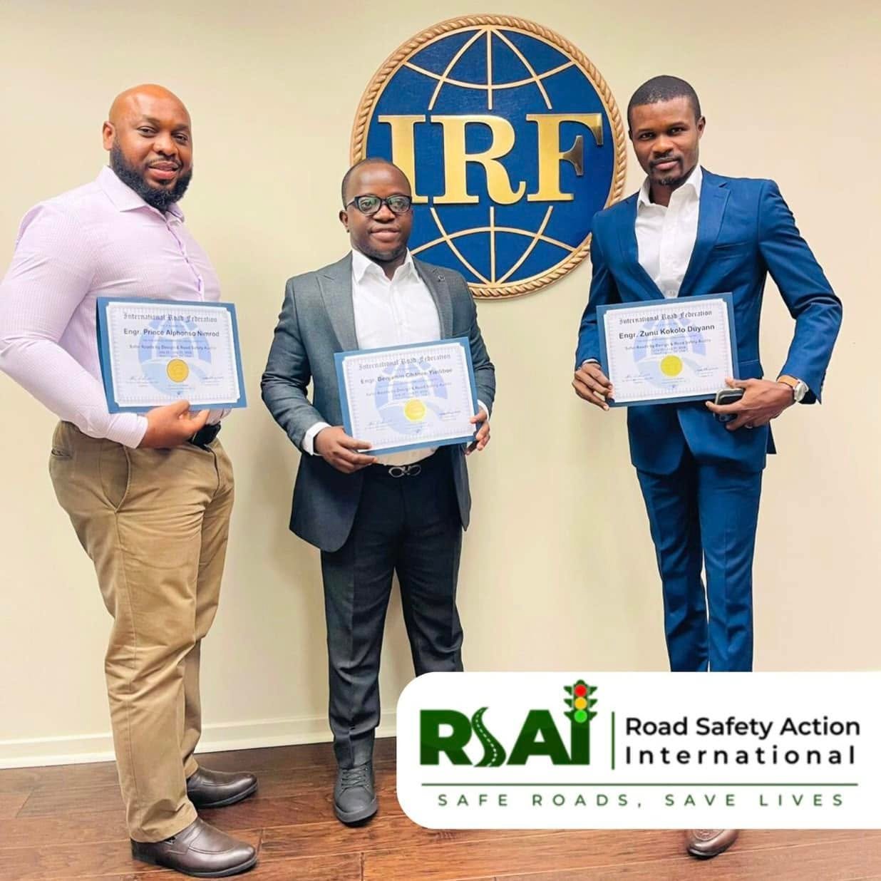 Officials display their IRF training certificates.