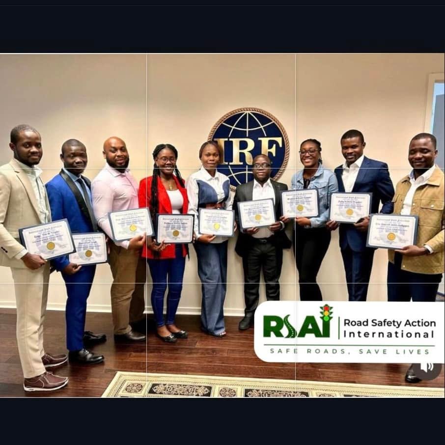 Graduates with their International Road Federation certificates.