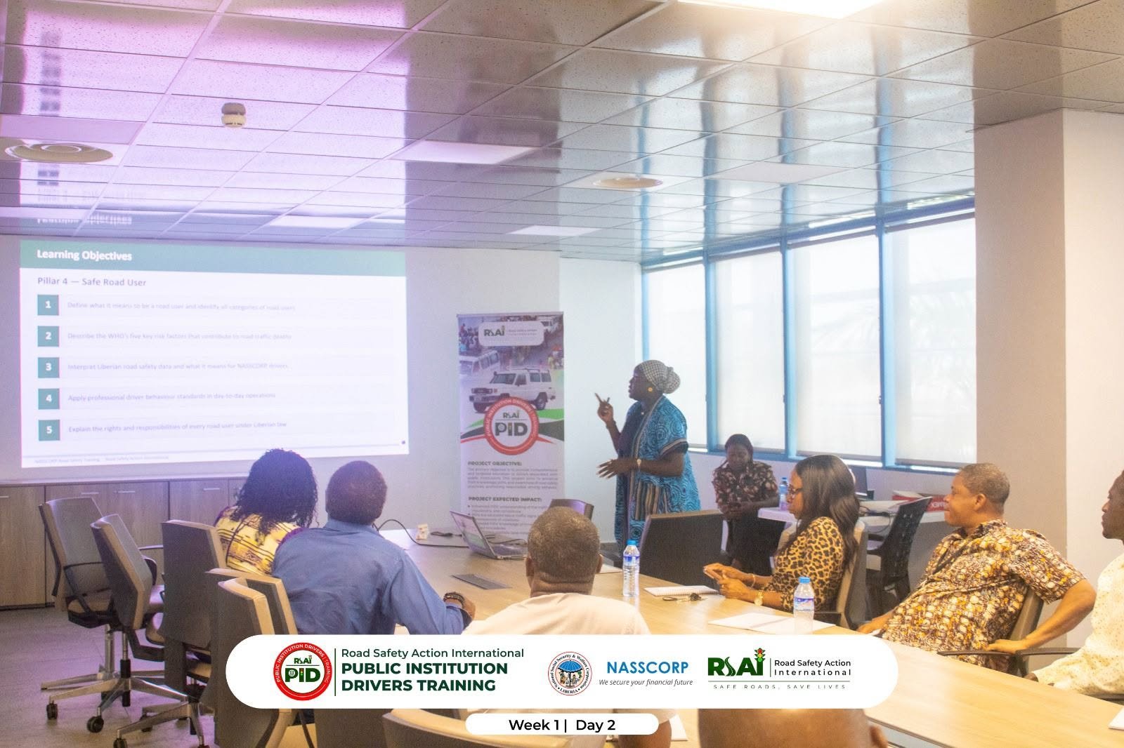 Classroom session on Pillar 4, Safe Road User learning objectives (Week 1, Day 2).